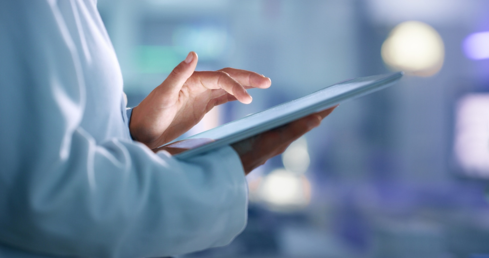 Laboratory technician working at the tablet