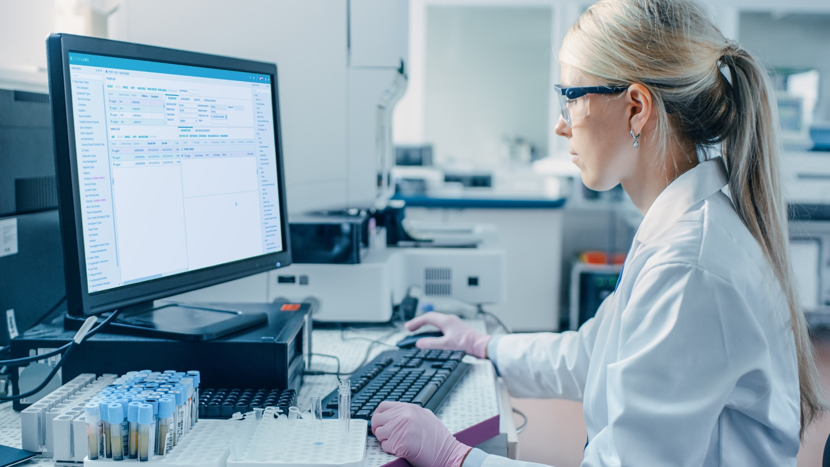 Laboratory manager tracks testing samples using STARLIMS laboratory information management system (LIMS) for Clinical Labs.