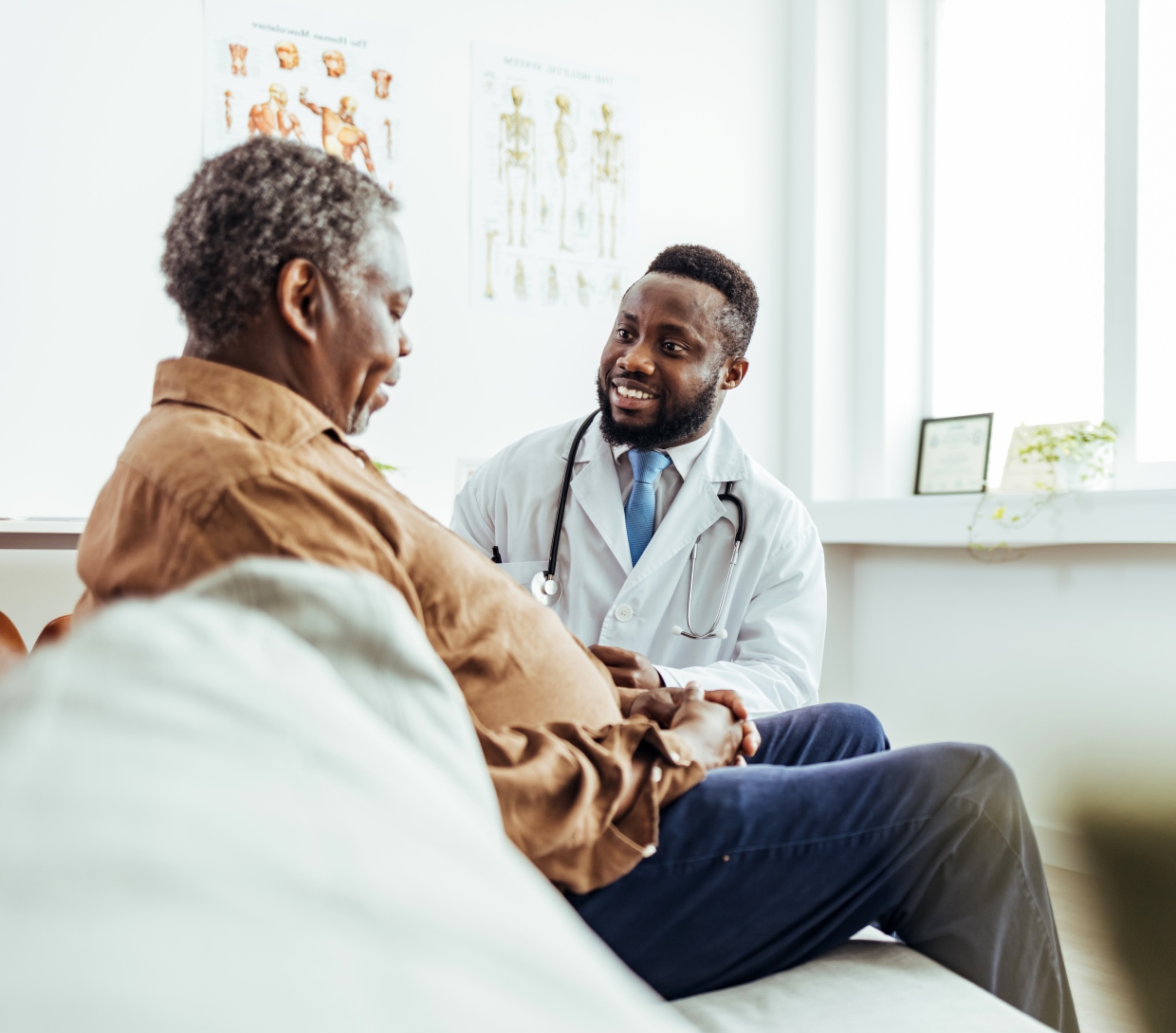 Male doctor with patient